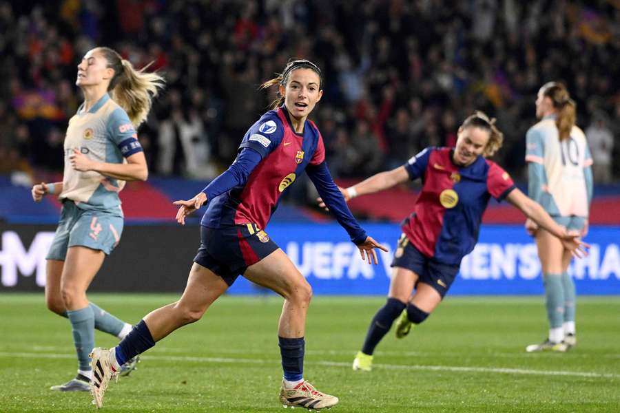 Barcelona's Spanish midfielder #14 Aitana Bonmati celebrates scoring her team's second goal 