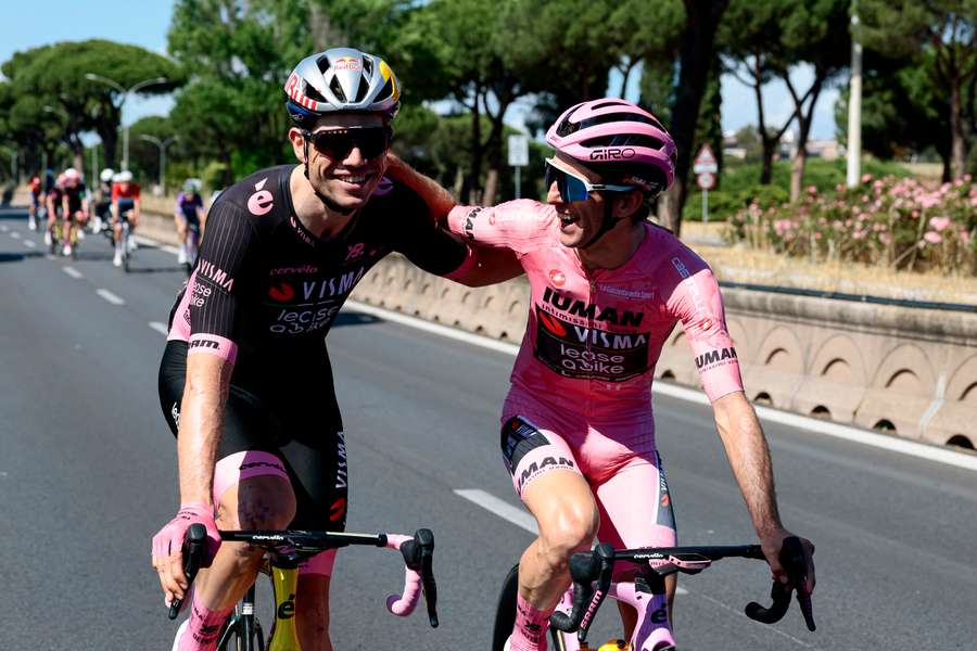 Wout Van Aert and teammate Simon Yates (wearing the pink jersey) ride during the 21st and last stage of the 108th Giro d'Italia on Sunday