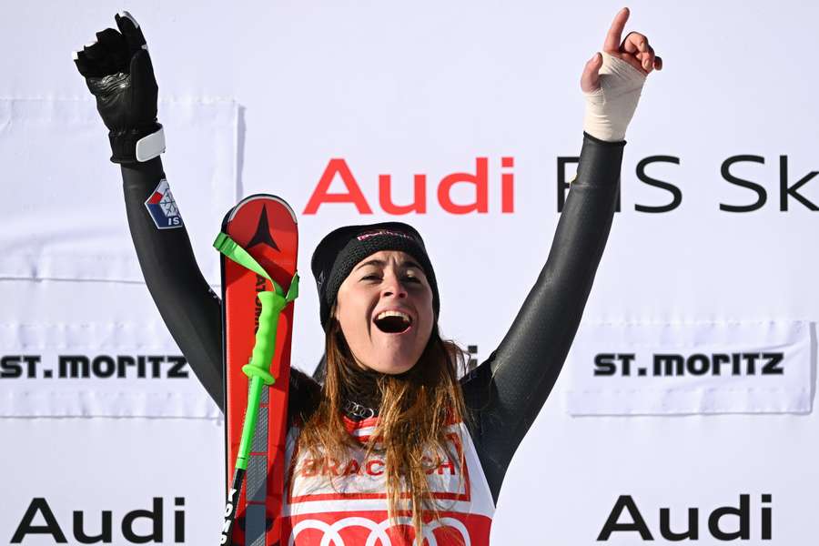 Sofia Goggia celebrates after winning the Women's Downhill event during the FIS Alpine Ski World Cup in Saint-Moritz.