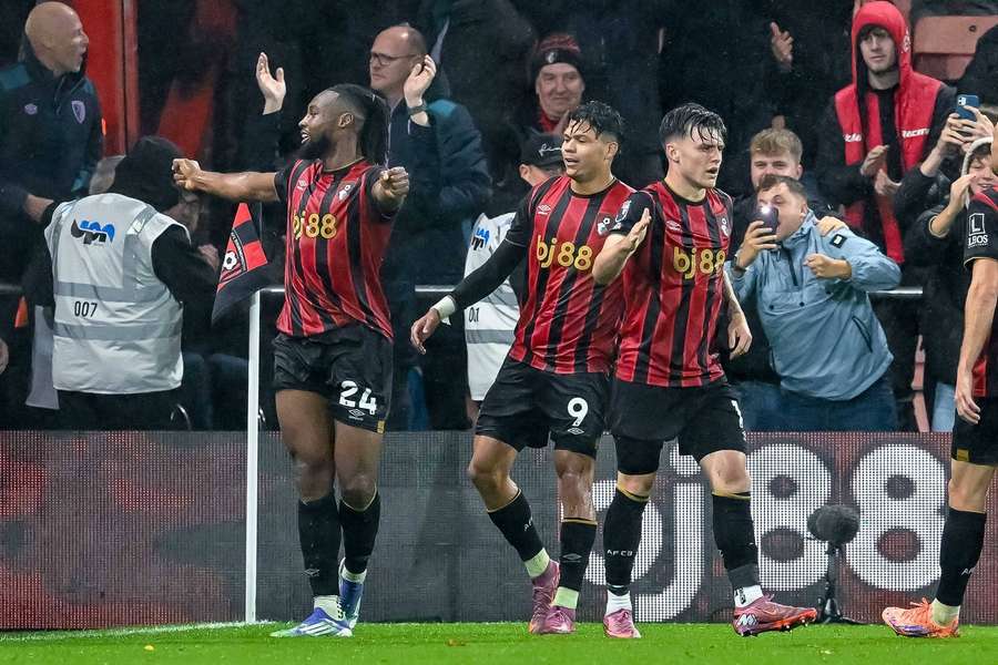 Semenyo (left) celebrates scoring for Bournemouth