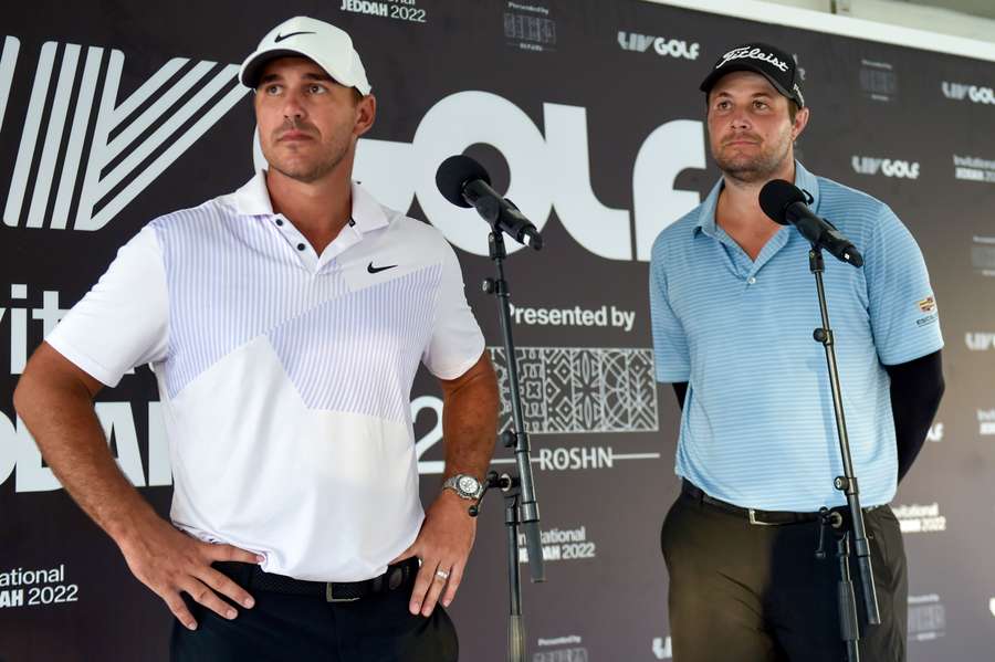 Brooks Koepka (L) and Peter Uihlein attend a press conference at the LIV Golf Invitational Jeddah