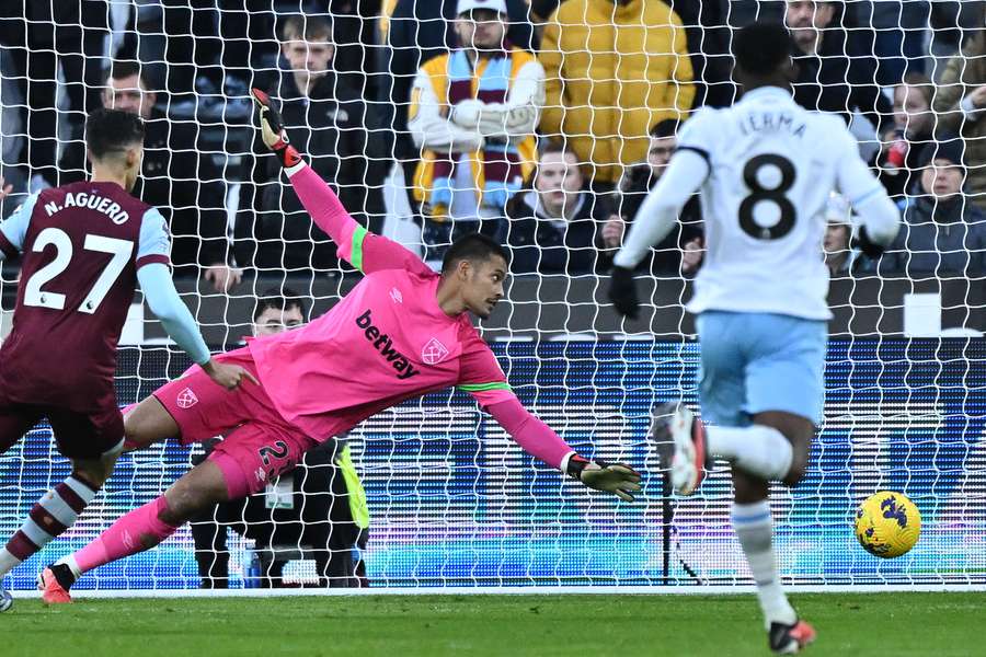 West Ham United's French goalkeeper #23 Alphonse Areola watches a shot from Crystal Palace's French striker #22 Odsonne Edouard beat him