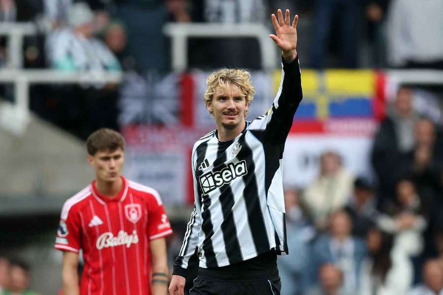 Nick Woltemade of Newcastle United celebrates scoring his team's second goal 