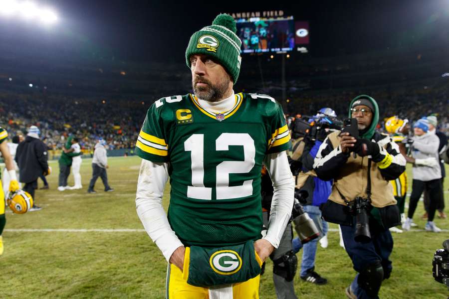 Green Bay Packers quarterback Aaron Rodgers walks off the field following the game against the Detroit Lions