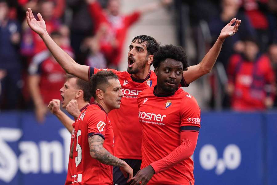 Alejandro Catena of CA Osasuna celebrates scoring his team's first goal against Atletico Madrid