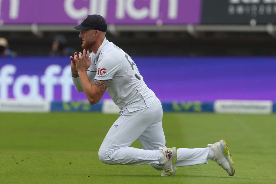 England's captain Ben Stokes takes the catch to dismiss Australia's Pat Cummins off the bowling of England's Ollie Robinson on day three of the first Ashes cricket Test