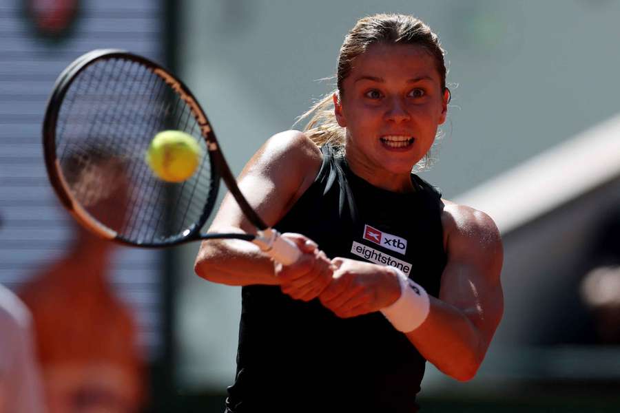 Poland's Maja Chwalinska in action during her fourth round match against France's Diane Parry