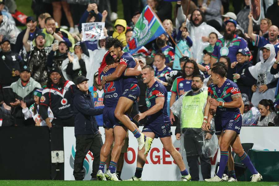 Alofiana Khan-Pereira celebrates a try with teammates and supporters in Kogarah on Saturday. Alofiana Khan-Pereira celebrates a try with teammates and supporters in Kogarah on Saturday.