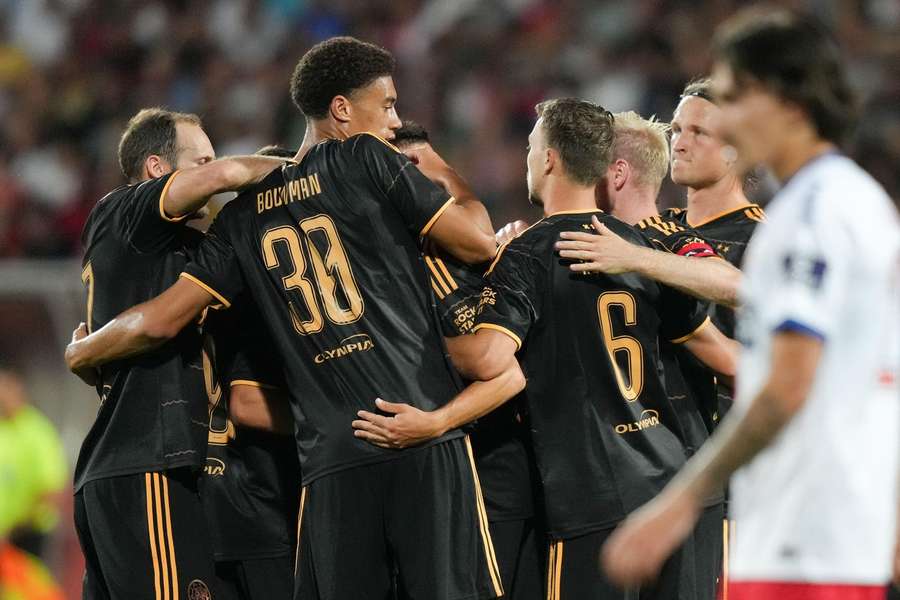 Ajax celebrate the 2-1 scored by Steven Berghuis