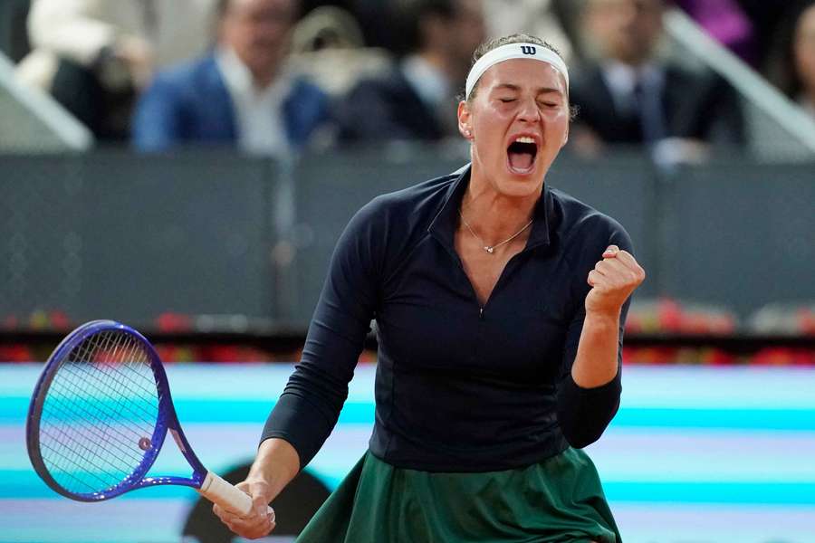 Marta Kostyuk celebrates