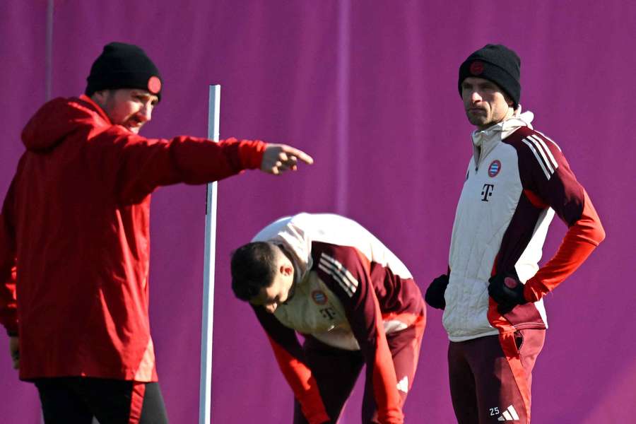 Muller (right) has won a record 12 Bundesliga titles with Bayern