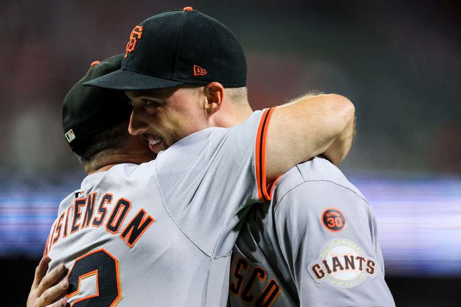 San Francisco Giants starting pitcher Blake Snell hugs bench coach Ryan Christenson after throwing a no-hitter against the Cincinnati Reds