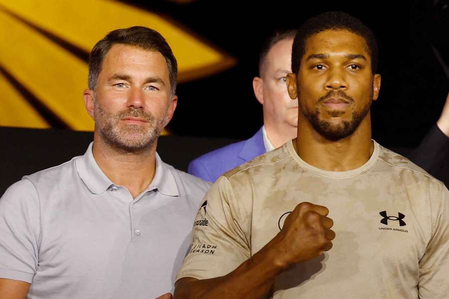 Anthony Joshua and promotor Eddie Hearn pose during the press conference Anthony Joshua and promotor Eddie Hearn pose during the press conference