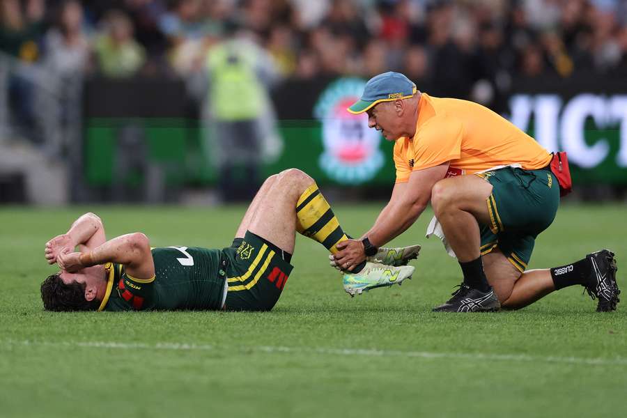 Mitch Moses receiving medical attention against New Zealand. Mitch Moses receiving medical attention against New Zealand.
