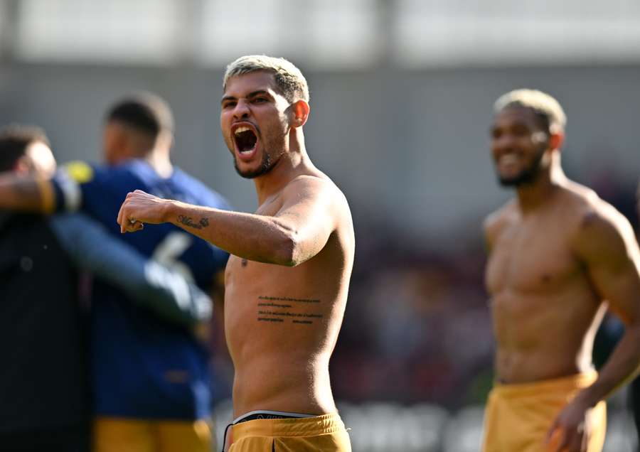 Newcastle United's Brazilian midfielder Bruno Guimaraes celebrates after the English Premier League football match between Brentford and Newcastle