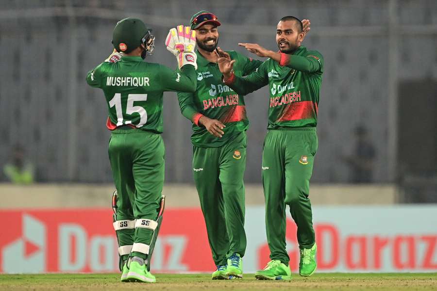 Bangladesh players celebrate in their ODI match against England