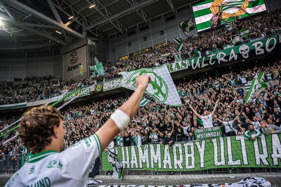 Hampus Skoglund celebrates with the Hammarby fans after his grabbed two assists against Hacken