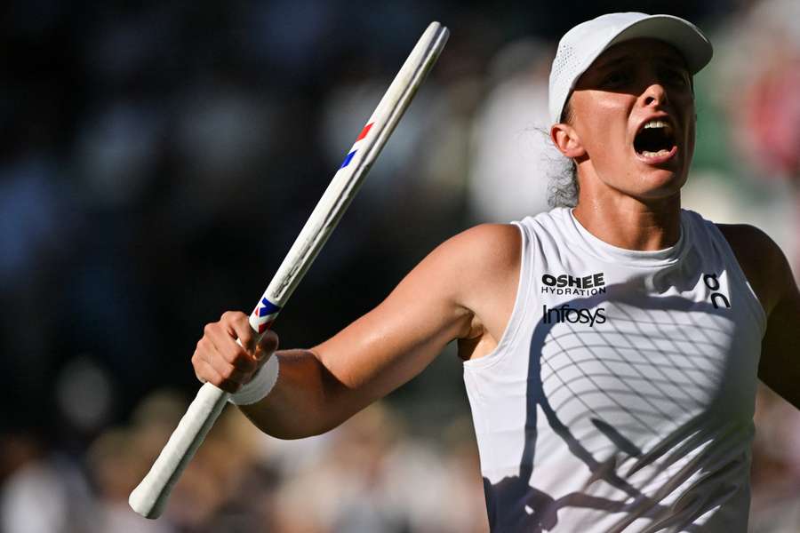 Iga Swiatek celebrates after her crushing victory over Belinda Bencic