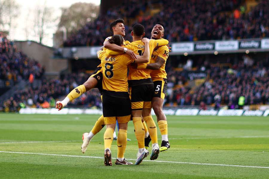 Wolves' players celebrate the goal