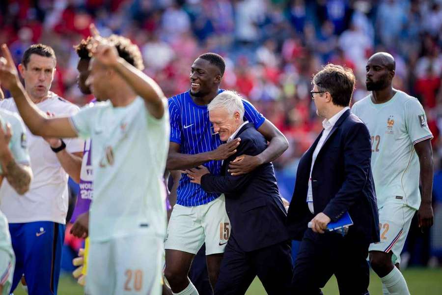 France's Ibrahima Konate embraces manager Didier Deschamps France's Ibrahima Konate embraces manager Didier Deschamps