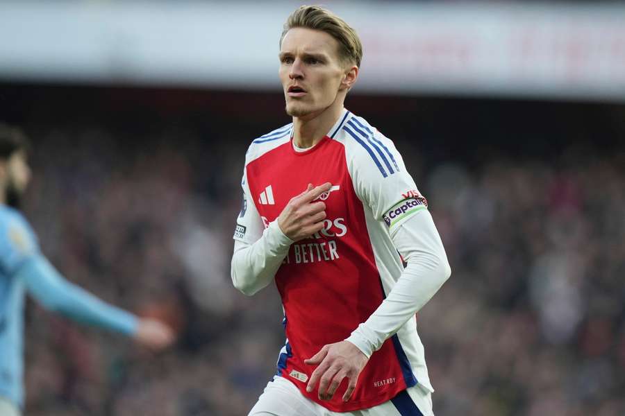 Odegaard celebrates his goal against Manchester City