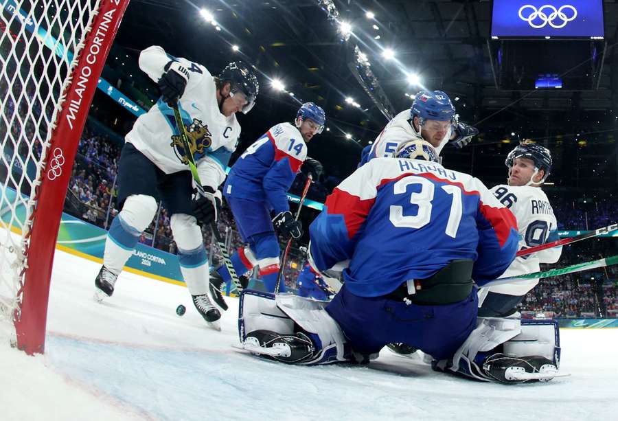 Samuel Hlavaj, Martin Marincin and Peter Ceresnak of Slovakia in action with Mikko Rantanen and Roope Hintz of Finland