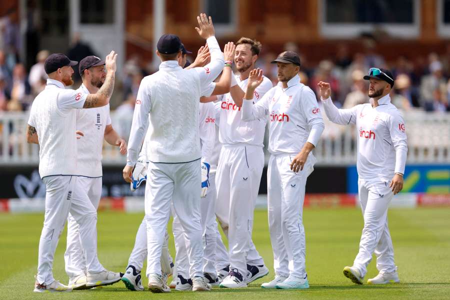 England celebrate dismissing Nathan Lyon