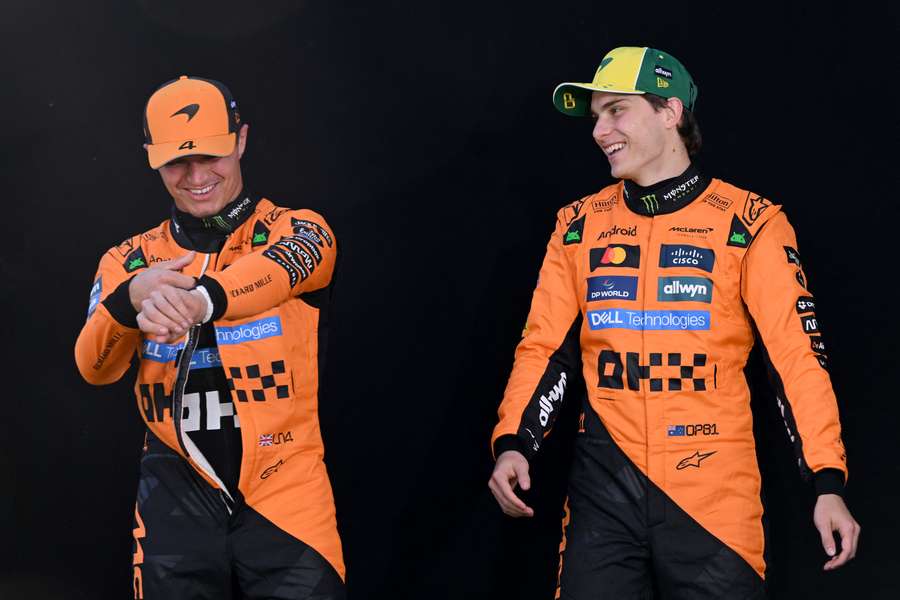 McLaren's British driver Lando Norris (L) leads the early Formula 1 championship