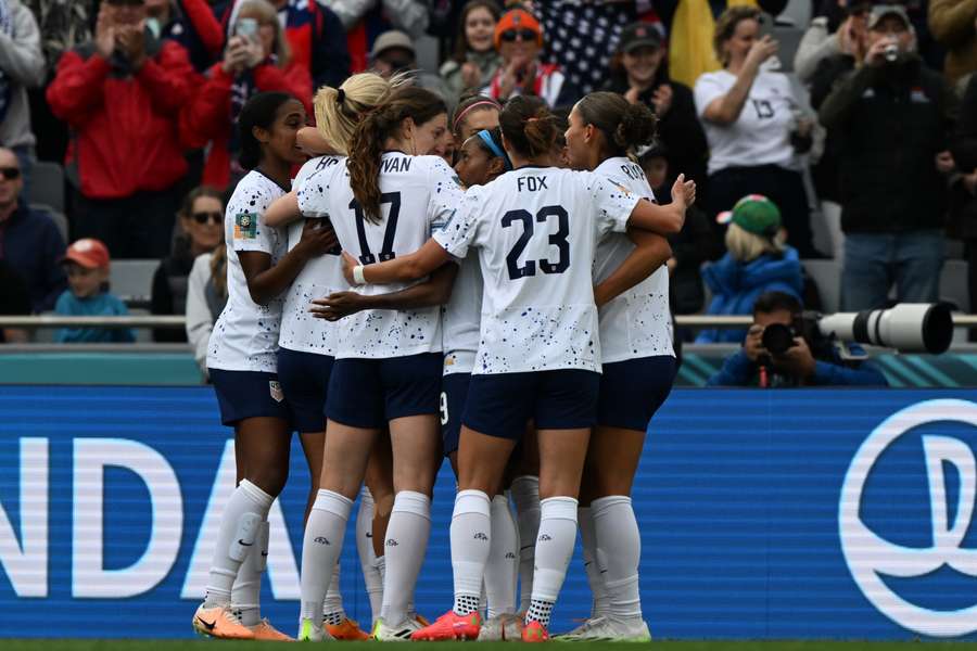The USWNT celebrate against Vietnam