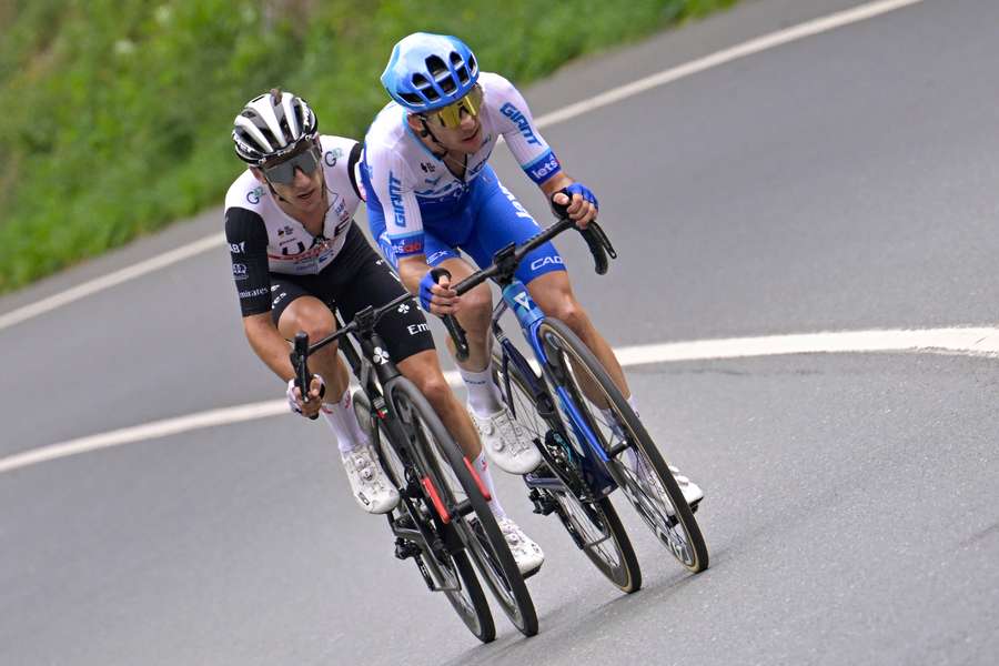 Adam Yates (L) trails twin Simon Yates down the final descent on the opening stage of the Tour de France