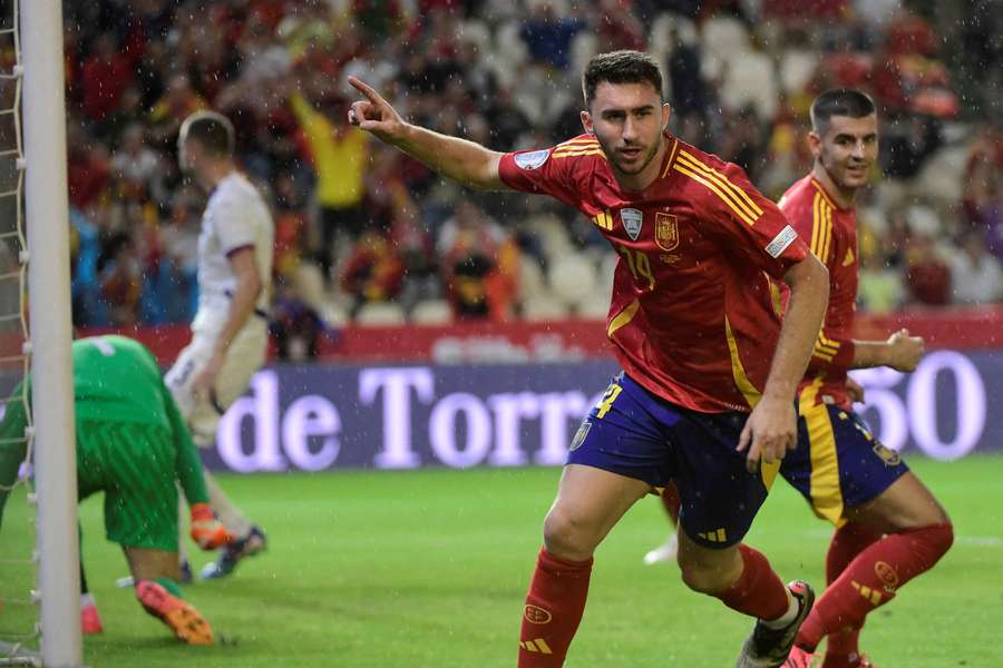 Spain's Aymeric Laporte celebrates the opening goal of the game