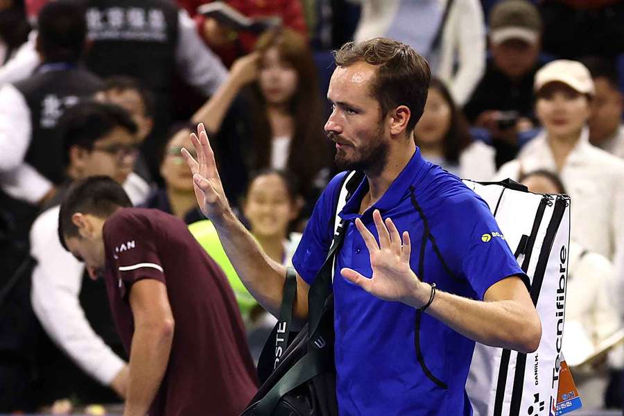 Daniil Medvedev with Novak Djokovic after being disqualified from his semi-final match for hitting a ball into the crowd and injuring a spectator Daniil Medvedev with Novak Djokovic after being disqualified from his semi-final match for hitting a ball into the crowd and injuring a spectator