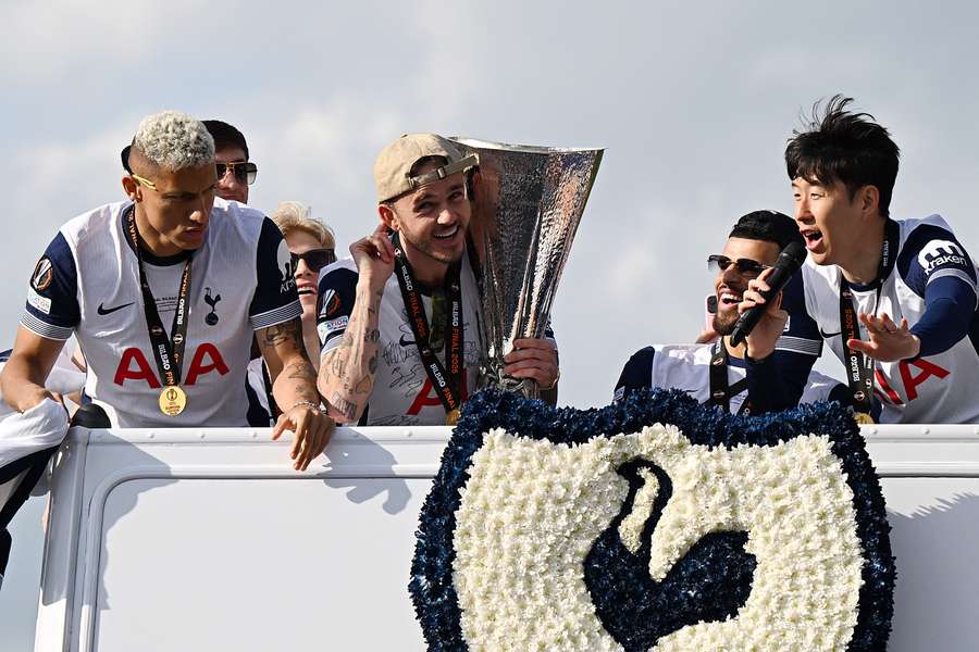 Son Heung-Min of Tottenham Hotspur speaks into a microphone as teammate James Maddison holds the UEFA Europa League trophy Son Heung-Min of Tottenham Hotspur speaks into a microphone as teammate James Maddison holds the UEFA Europa League trophy