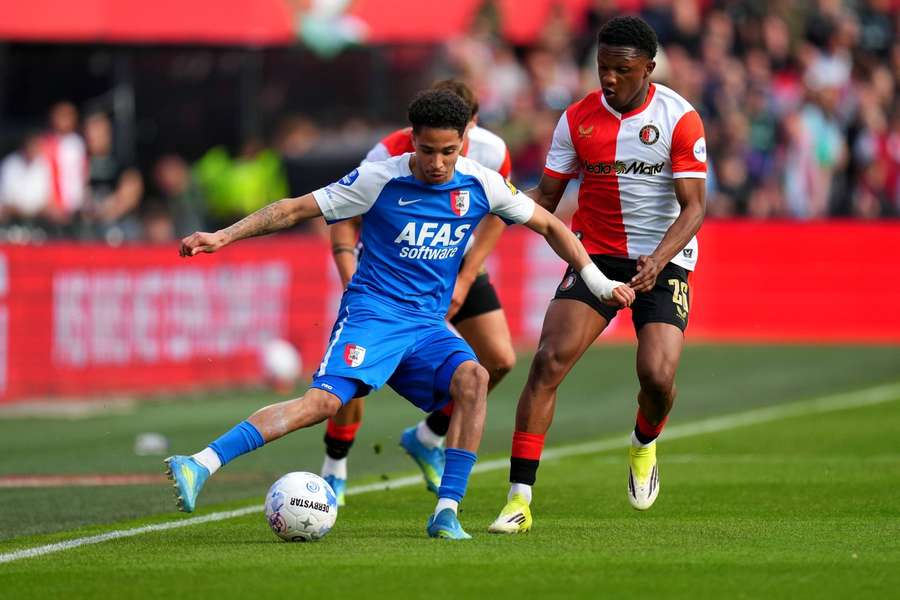 AZ's Ro-Zangelo Daal battles Feyenoord defender Givairo Read AZ's Ro-Zangelo Daal battles Feyenoord defender Givairo Read