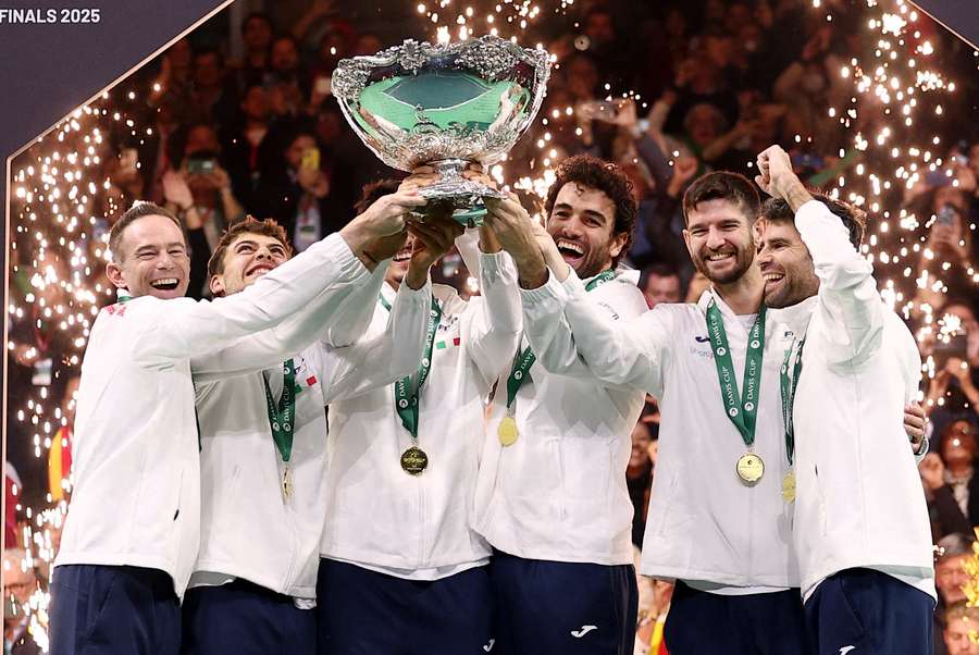 Italy celebrate with the trophy after winning the Davis Cup in 2025 Italy celebrate with the trophy after winning the Davis Cup in 2025