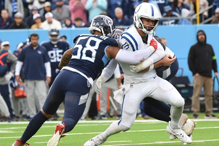 Tennessee Titans linebacker Harold Landry III and linebacker Arden Key combine for a sack on Indianapolis Colts quarterback Gardner Minshew