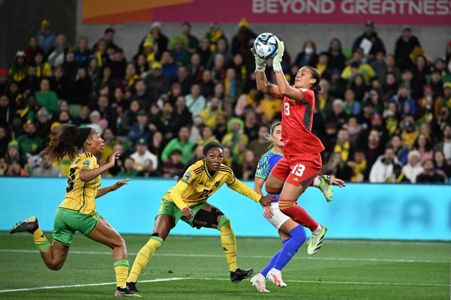 Spencer (R) claims the ball against Brazil