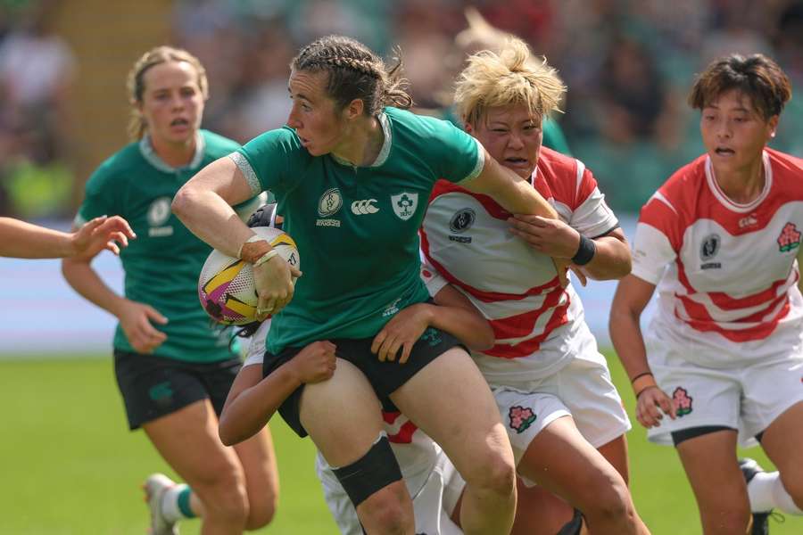Eve Higgins is tackled by Asuka Kuge Eve Higgins is tackled by Asuka Kuge