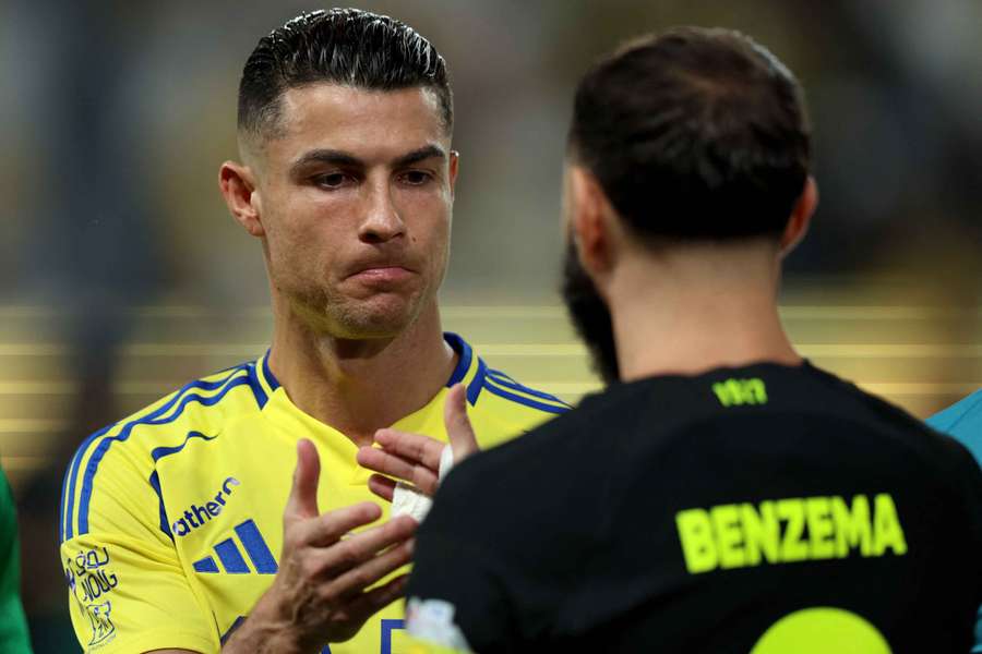 Cristiano Ronaldo of Al Nassr and Karim Benzema of Al Ittihad shake hands