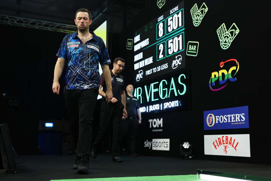 Luke Humphries walks off the stage after his win
