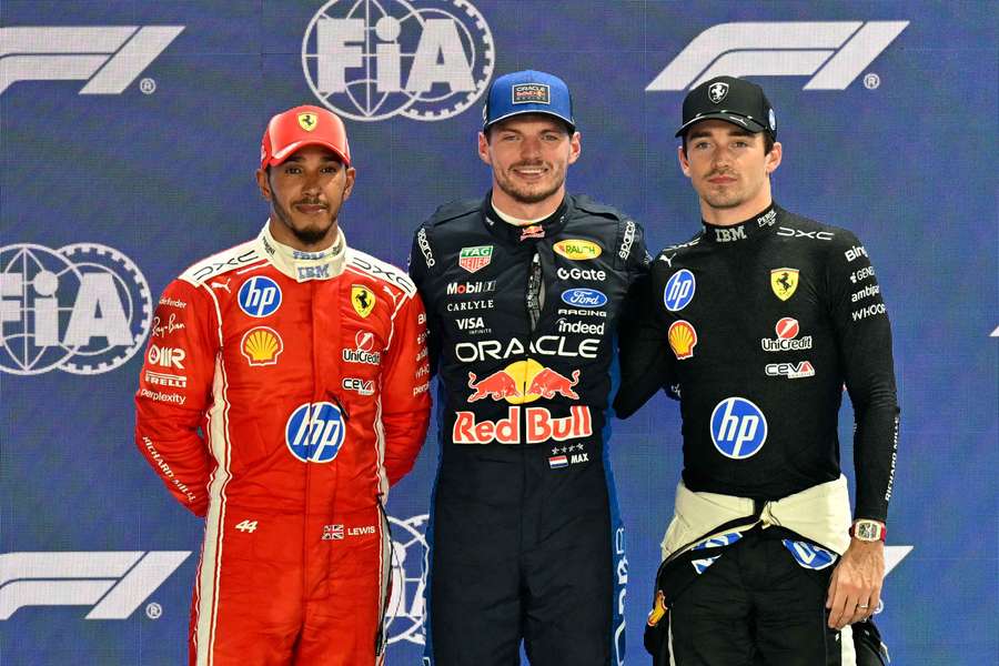 Max Verstappen celebrates on the podium after qualifying in pole position with second-placed Charles Leclerc and third-placed Lewis Hamilton Max Verstappen celebrates on the podium after qualifying in pole position with second-placed Charles Leclerc and third-placed Lewis Hamilton