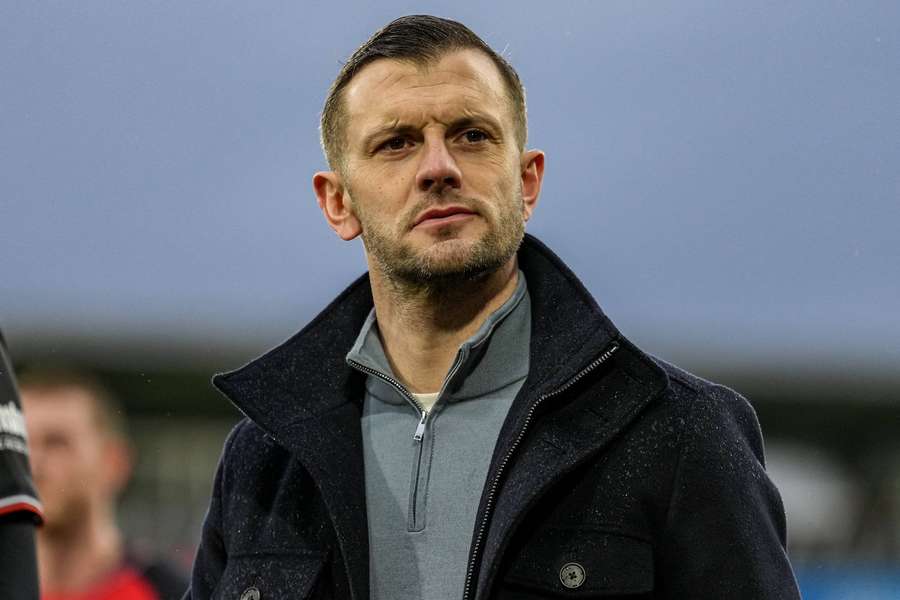 Wilshere clashes with Luton fans as players intervene
