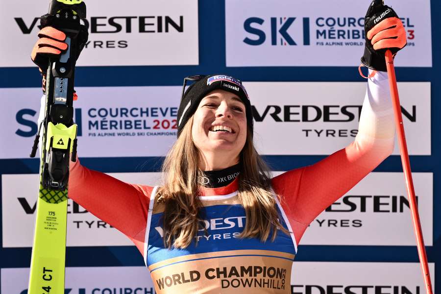 Jasmine Flury celebrates on the podium after the Women's Downhill event of the FIS Alpine Ski World Championship 2023