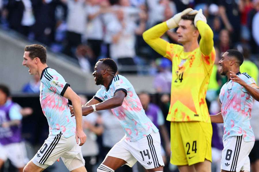 Hans Vanaken celebrates scoring Belgium's third goal with Dodi Lukebakio and Youri Tielemans as USA's Matt Freese looks dejected Hans Vanaken celebrates scoring Belgium's third goal with Dodi Lukebakio and Youri Tielemans as USA's Matt Freese looks dejected