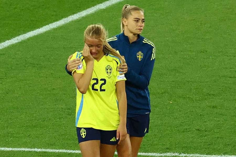 Sweden's Smilla Holmberg and Sweden's Fridolina Rolfo look dejected after losing the penalty shootout Sweden's Smilla Holmberg and Sweden's Fridolina Rolfo look dejected after losing the penalty shootout