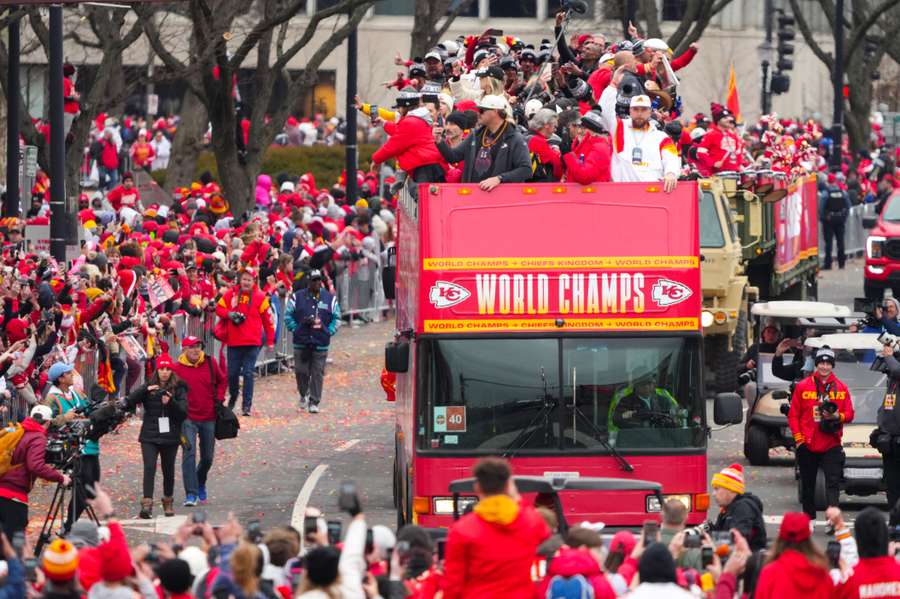 Kansas City Chiefs players celebrate during their Super Bowl LVII victory parade 