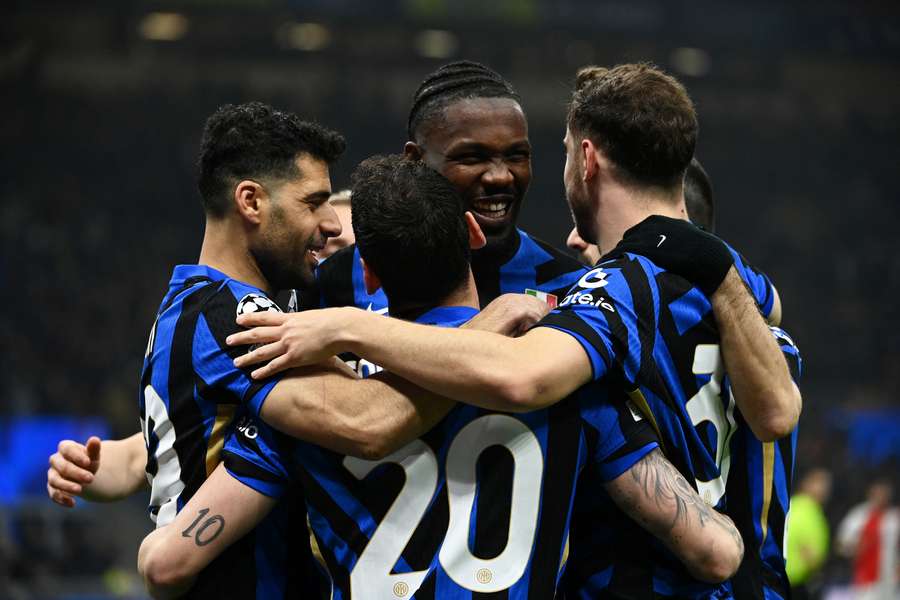 Inter celebrate their second goal against Feyenoord