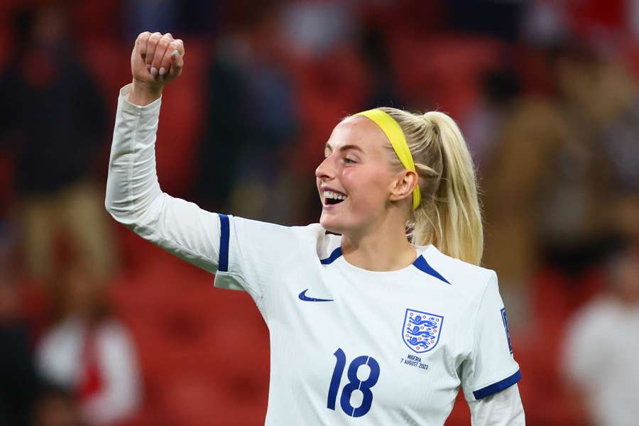 England's forward #18 Chloe Kelly celebrates their victory after a penalty shoot-out