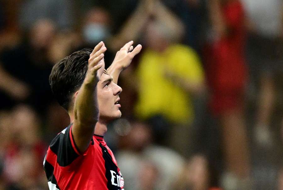AC Milan's Ardon Jashari celebrates their second goal an own goal scored by Venezia's Redouane Halhal