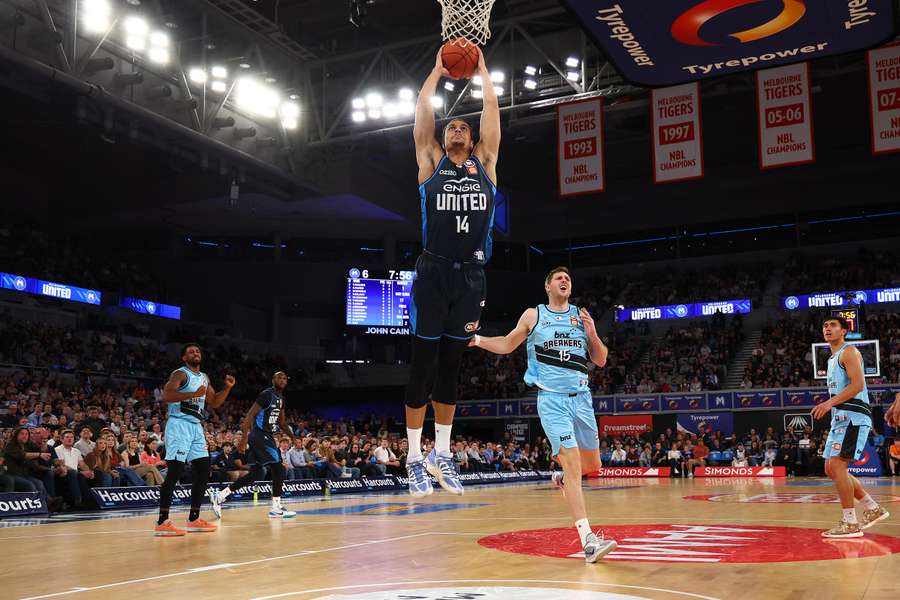 Melbourne United centre Jesse Edwards drives to the basket to score against the Breakers on Sunday afternoon.